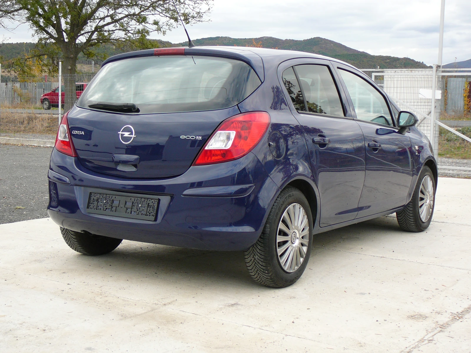 Opel Corsa 1.2i юбилейна, снимка 6 - Автомобили и джипове - 56731417