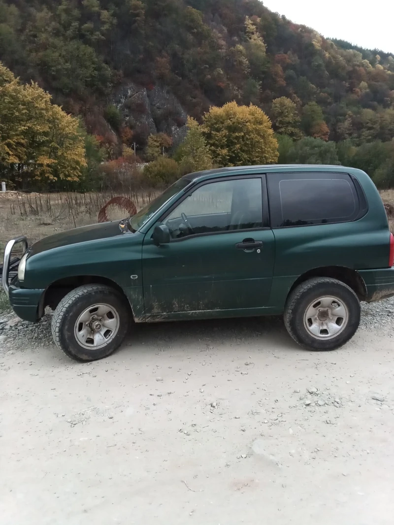 Suzuki Grand vitara, снимка 8 - Автомобили и джипове - 52578357