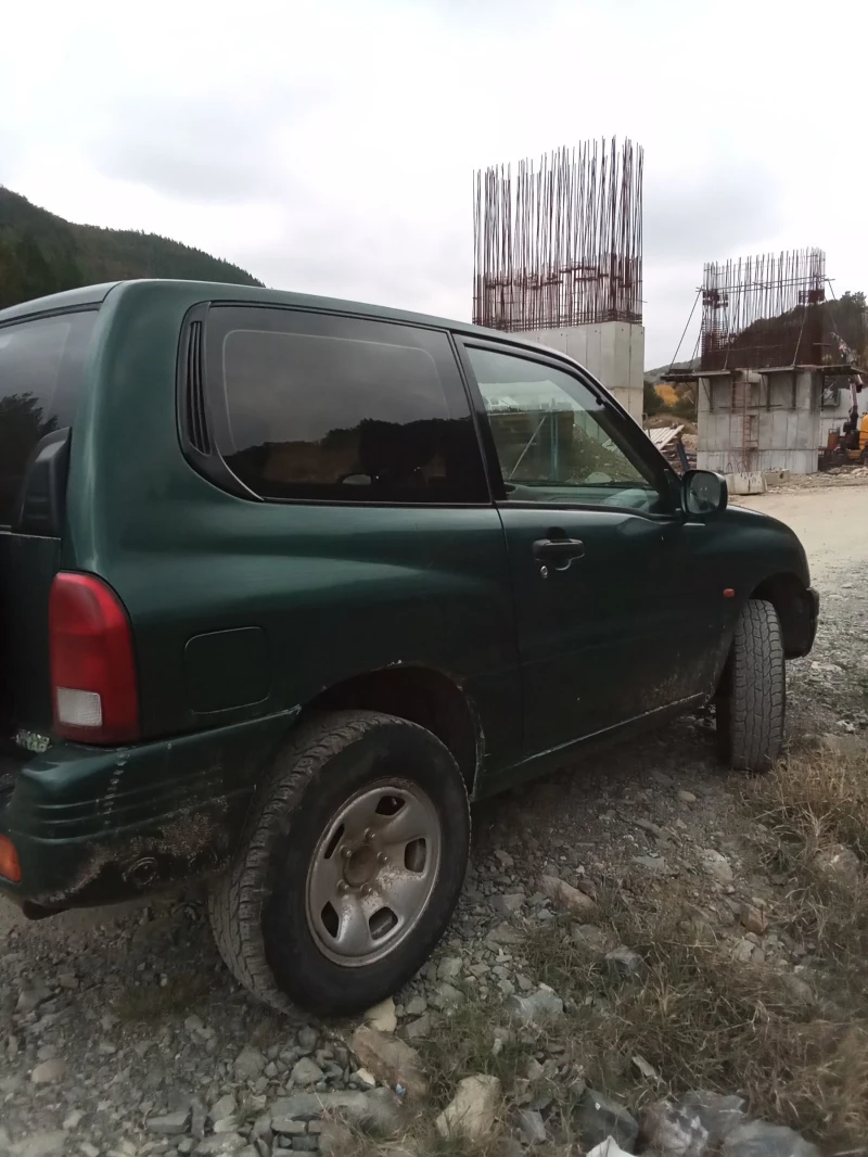 Suzuki Grand vitara, снимка 10 - Автомобили и джипове - 52578357
