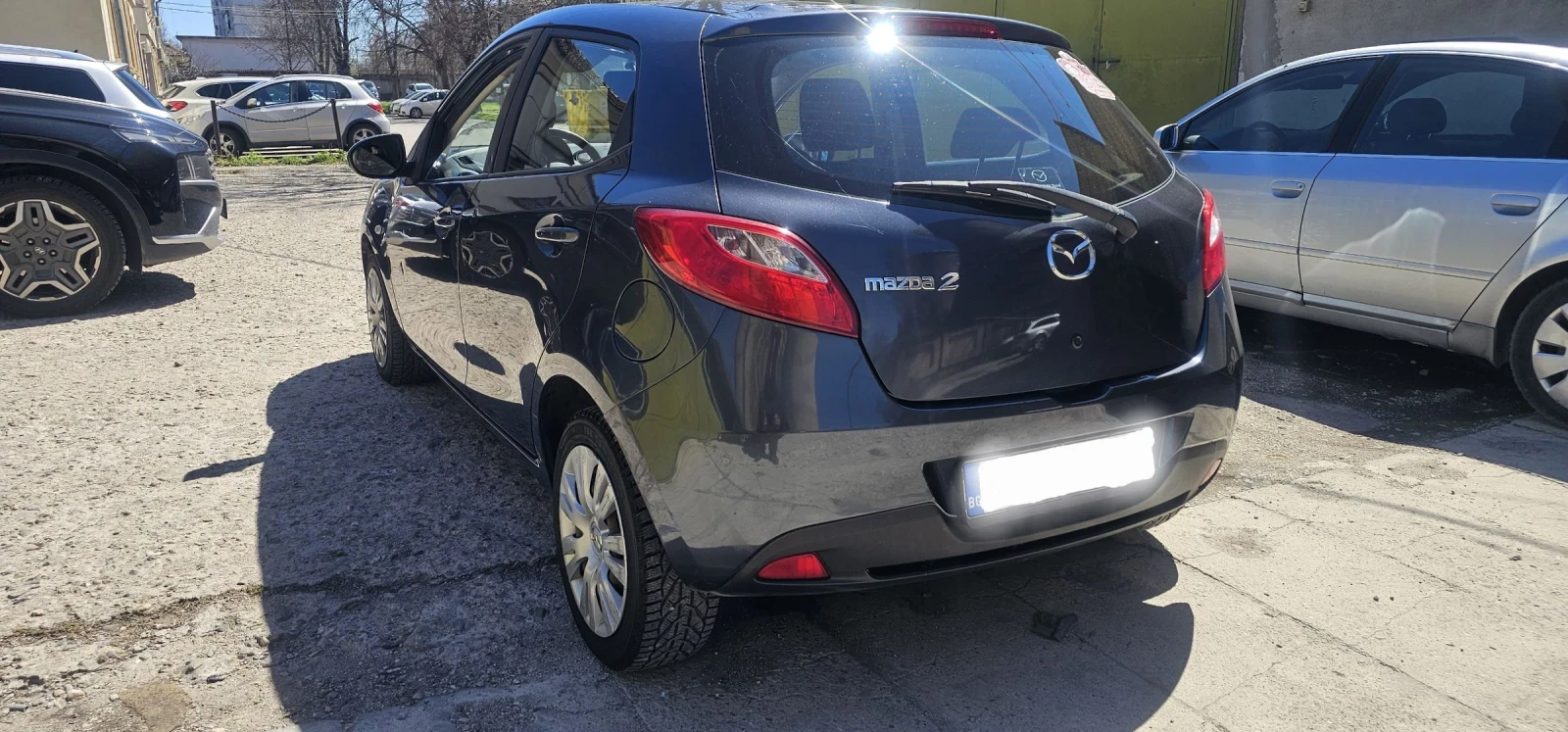 Mazda 2 1.4 hdi, снимка 12 - Автомобили и джипове - 54328152