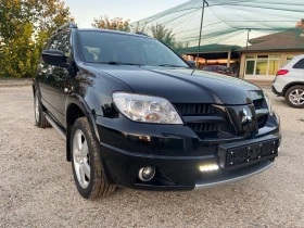 Mitsubishi Outlander 2.4I 4X4 Aвтомат Швейцария, снимка 1