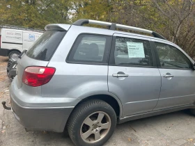 Mitsubishi Outlander 4 x 4, снимка 1