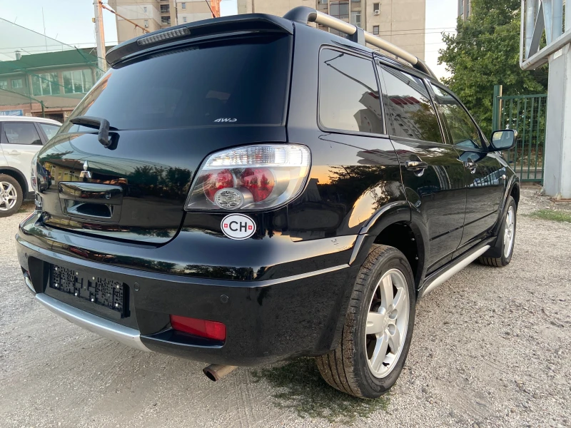 Mitsubishi Outlander 2.4I 4X4 Aвтомат Швейцария, снимка 3 - Автомобили и джипове - 47389741