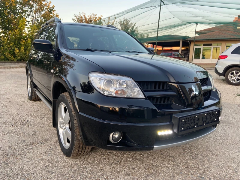 Mitsubishi Outlander 2.4I 4X4 Aвтомат Швейцария, снимка 1 - Автомобили и джипове - 47389741