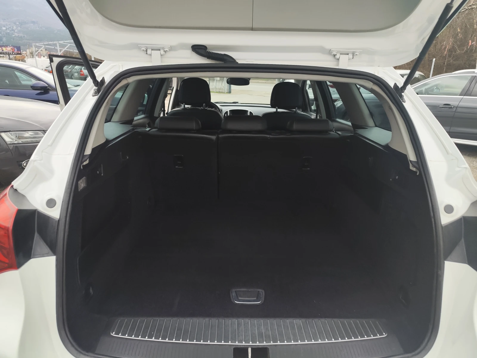 Opel Astra 1.7CDTi* EURO5A* Klimatronik* , снимка 13 - Автомобили и джипове - 53902866