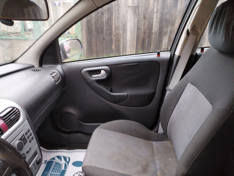 Opel Corsa 1.3 JTD, снимка 8 - Автомобили и джипове - 53413649