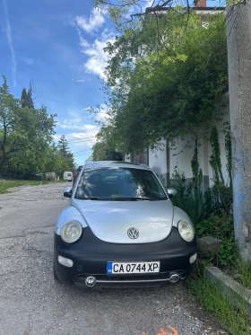 ������ VW New beetle