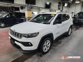������ Jeep Compass