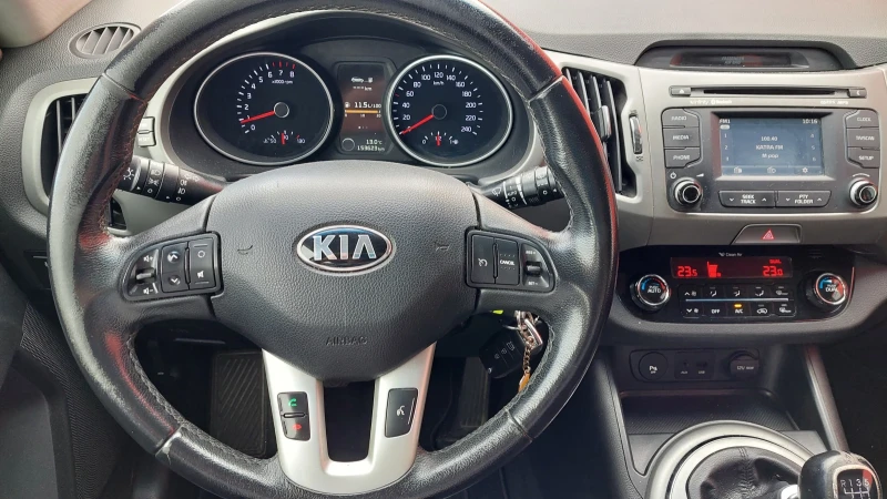 Kia Sportage 1.6FACE GAS, снимка 12 - Автомобили и джипове - 47406234