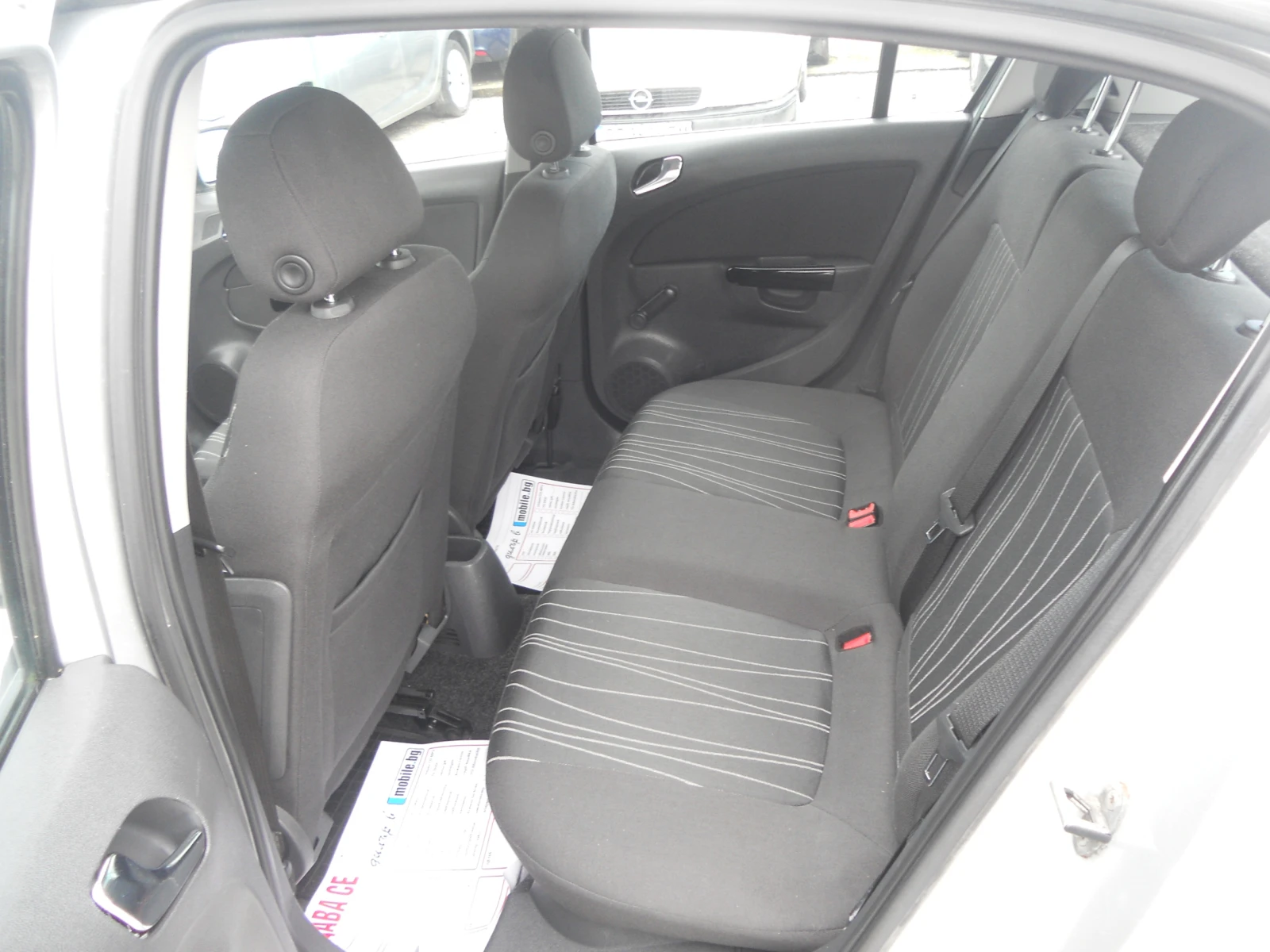 Opel Corsa 1.2i ЛИЗИНГ!!! РЕАЛНИ КИЛОМЕТРИ+ СЕРВИЗНИ ДОКУМЕНТ, снимка 7 - Автомобили и джипове - 55152747