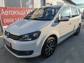     VW Touran 1.4i-150.- -5b 6-  