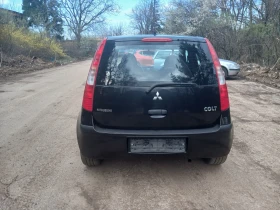 Mitsubishi Colt 1.1 - 1650 € / 3227.12 лв. - 92503569 7