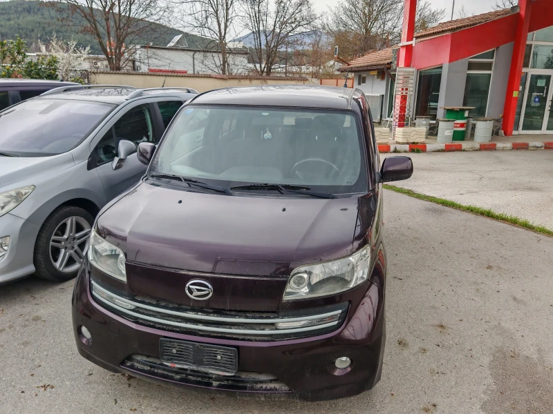 Daihatsu Materia 1.3 , снимка 12 - Автомобили и джипове - 48576661