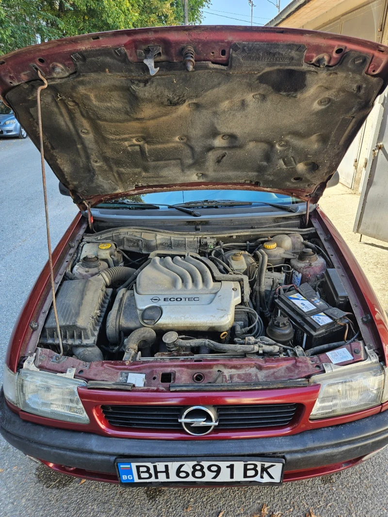 Opel Astra 1.6 ekotec , снимка 13 - Автомобили и джипове - 53115672