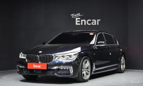 BMW 740 LI* XDRIVEM* SPORT* HARMON* KARDON* 3TV* ОБДУХВАНЕ, снимка 1