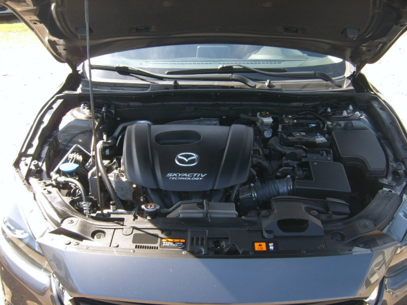 Mazda 3 1,5i   skyactiv, снимка 16 - Автомобили и джипове - 44958348