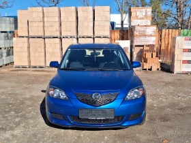 Mazda 3 1.4 i, снимка 3