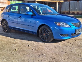 Mazda 3 1.4 i, снимка 4