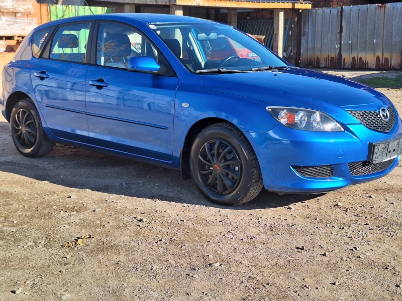 Mazda 3 1.4 i, снимка 4 - Автомобили и джипове - 48103598