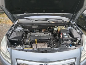 Opel Insignia 1.8 140кс , снимка 13
