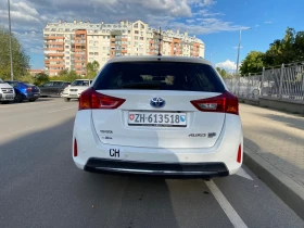 Обява за продажба на Toyota Auris 1.8 бензин/ ток ~15 390 лв. - изображение 2