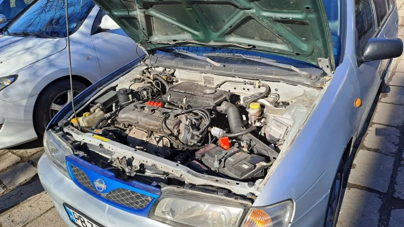 Nissan Almera 1.6SR, снимка 11 - Автомобили и джипове - 48738278