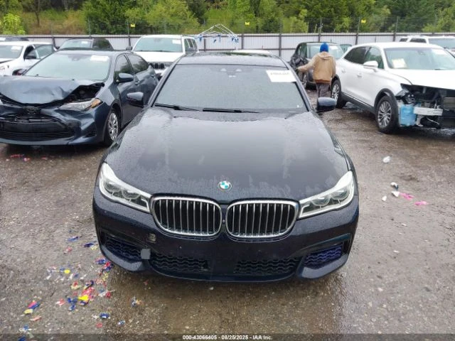 BMW 750 xDrive* HEAD UP* MEMORY* SOFT* AMBIENT* Harman* , снимка 11 - Автомобили и джипове - 52775710