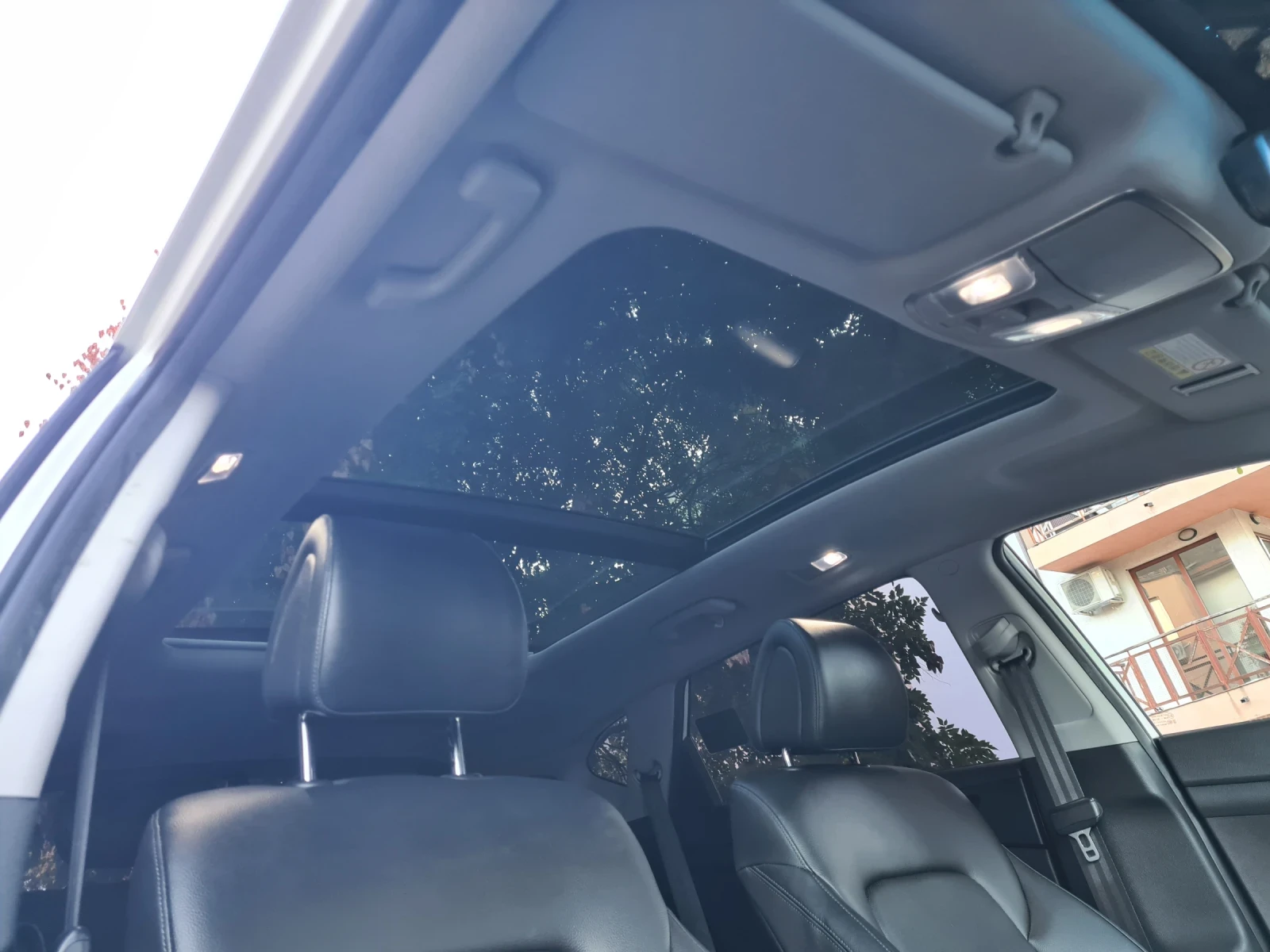 Hyundai Tucson 2.0 CRDI 4X4 , снимка 17 - Автомобили и джипове - 56350815