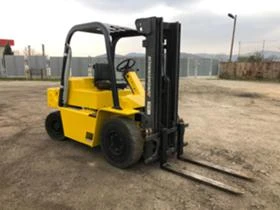 Мотокар Cat Перкинс, снимка 1