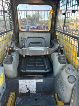 Мини челни товарачи Komatsu SK714, снимка 6