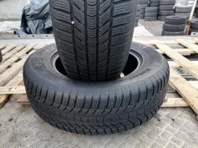 Гуми Зимни 235/65R17, снимка 2 - Гуми и джанти - 52699745