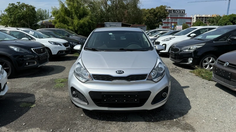 Kia Rio 1.4 ISG 6ск. Внос Швейцария! Navi, Tel., PDC, LED , снимка 2 - Автомобили и джипове - 47106554