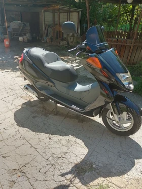 Honda Foresight, снимка 1