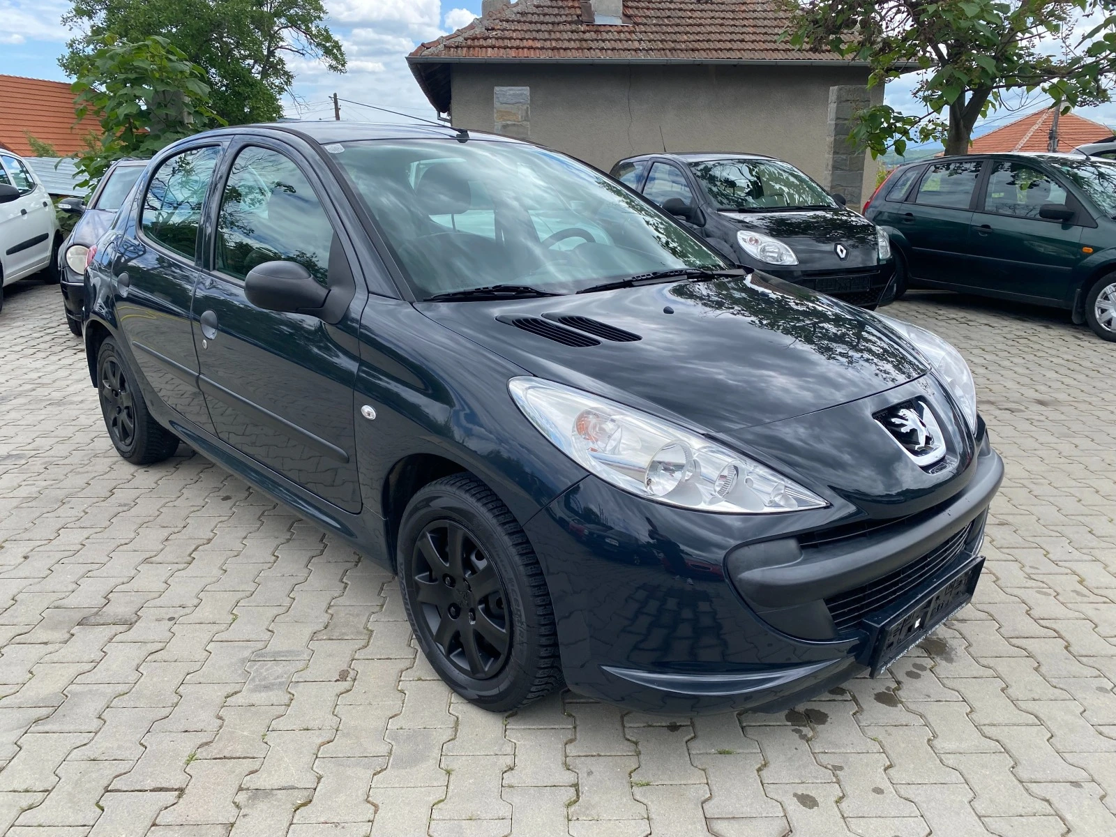 Peugeot 206 + 1.1 60к.с - изображение 6