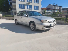 Nissan Primera ГАЗ, снимка 1
