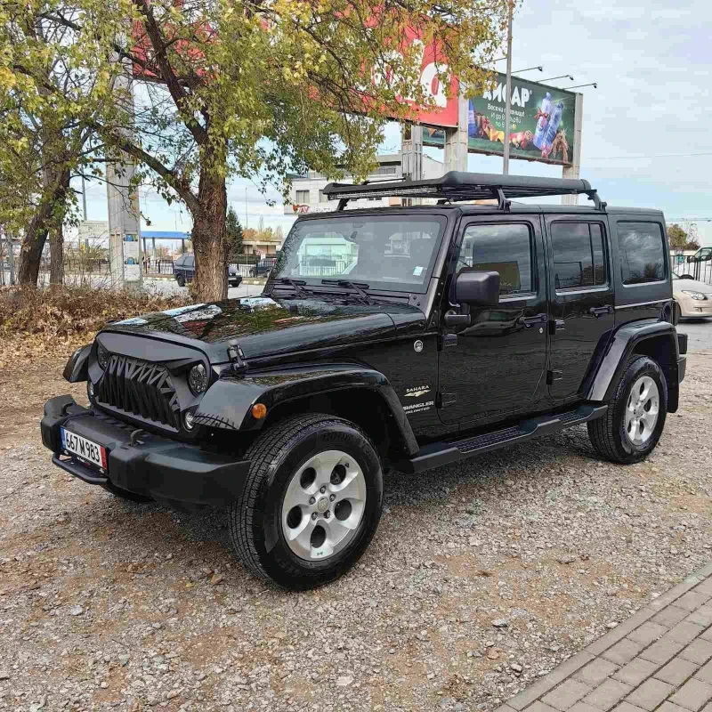 Jeep Wrangler Unlimited SAHARA, снимка 2 - Автомобили и джипове - 52316458