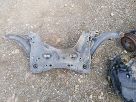 Преден мост за Нисан Микра К12 заедно с носачите., снимка 2 - Части - 52719245