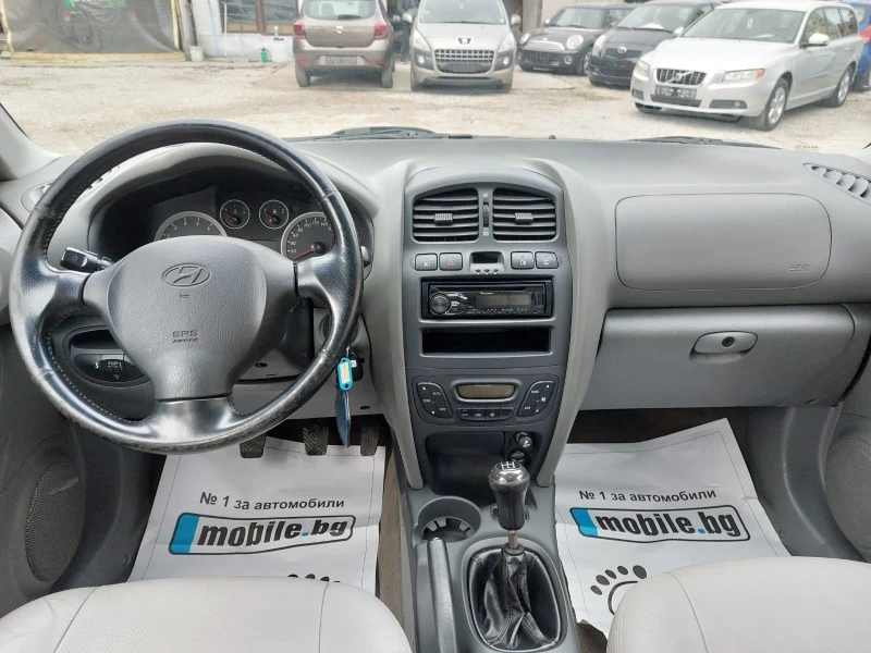 Hyundai Santa fe 2.4i KLIMA, снимка 11 - Автомобили и джипове - 44230944