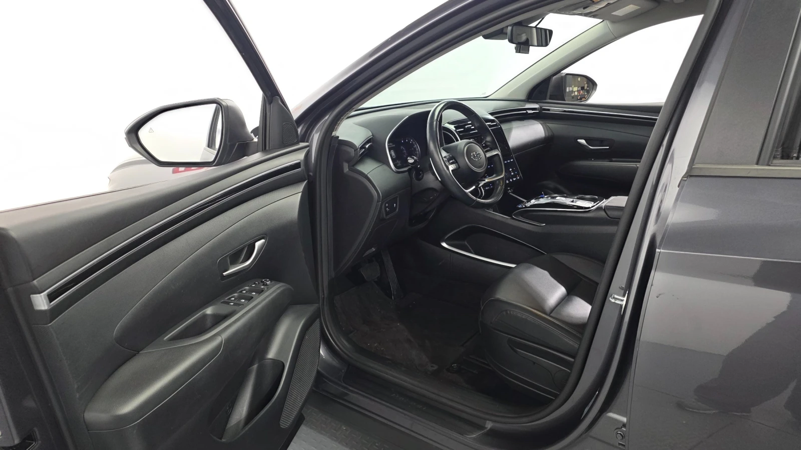 Hyundai Tucson 2.0 CRDi 2WD Modern, снимка 13 - Автомобили и джипове - 55328133