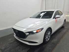 ������ Mazda 3