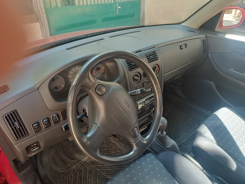 Daihatsu Sirion, снимка 5 - Автомобили и джипове - 52664095