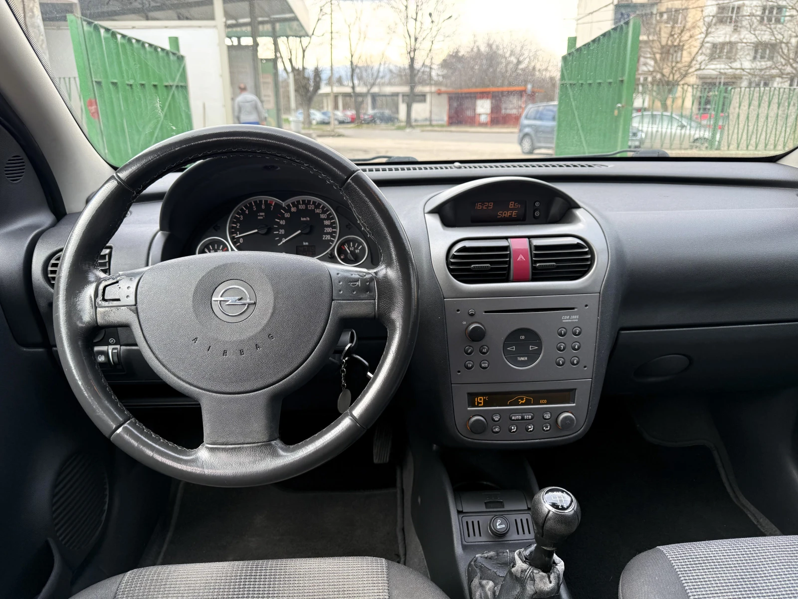 Opel Corsa 1.2i 75 к.с., снимка 10 - Автомобили и джипове - 54020817