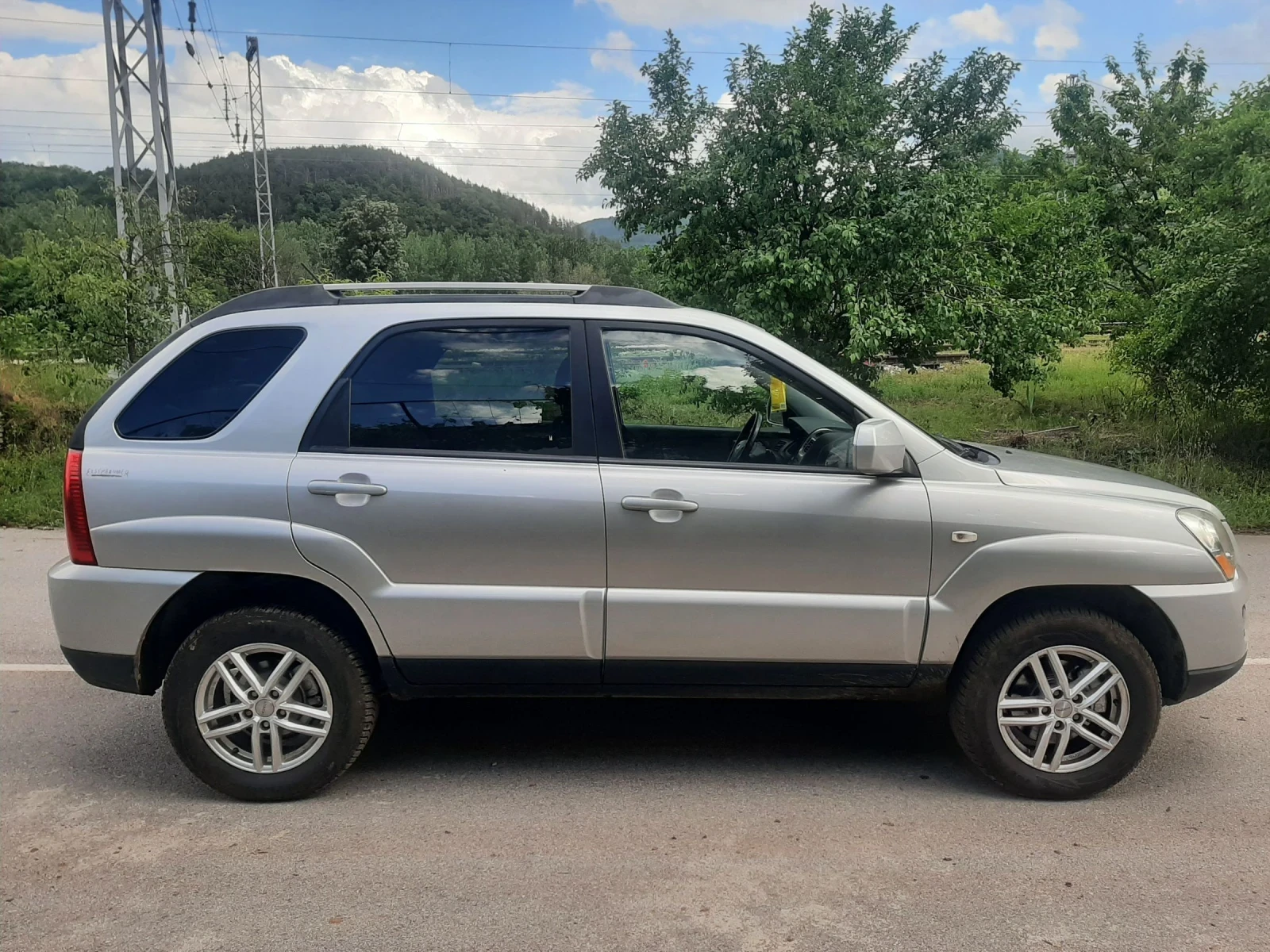 Kia Sportage 2.0 CRDI FEIS 4x4KLIMATRON, снимка 8 - Автомобили и джипове - 54718021