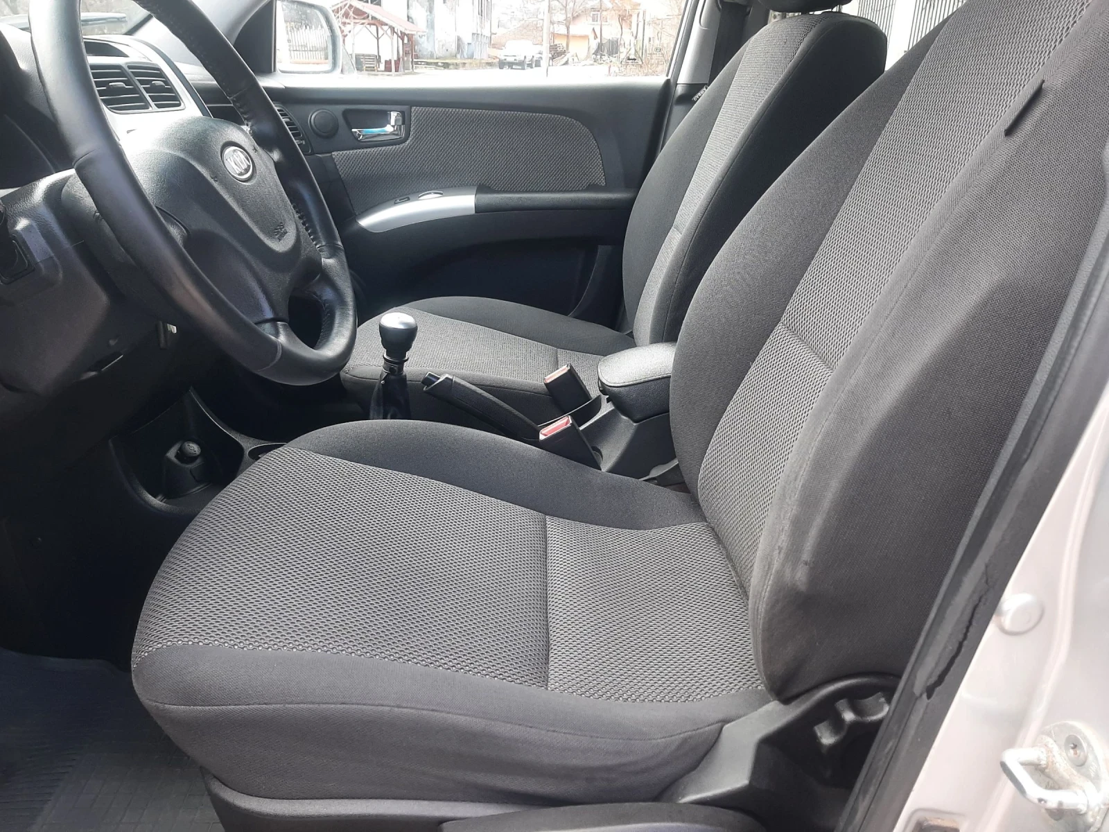 Kia Sportage 2.0 CRDI FEIS 4x4KLIMATRON, снимка 12 - Автомобили и джипове - 54718021