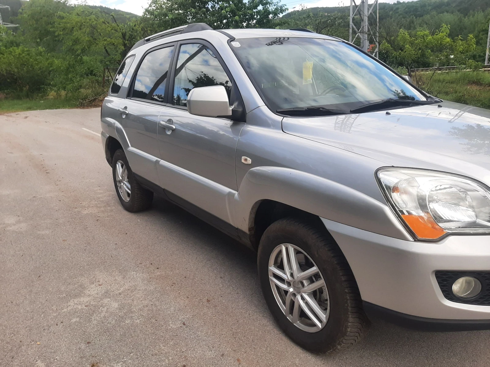 Kia Sportage 2.0 CRDI FEIS 4x4KLIMATRON, снимка 7 - Автомобили и джипове - 54718021