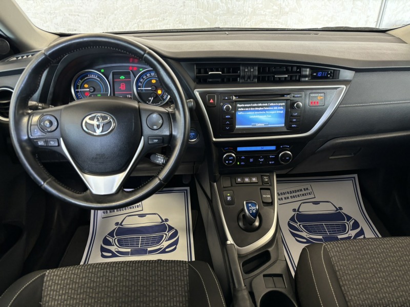 Toyota Auris 1.8 HYBRID, снимка 13 - Автомобили и джипове - 45695527