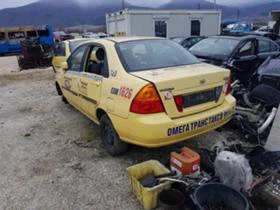 Suzuki Liana 1.3,1.6.-5бр., снимка 11