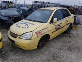 Suzuki Liana 1.3,1.6.-5бр., снимка 2