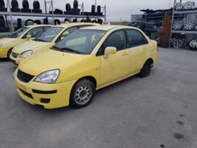 Suzuki Liana 1.3,1.6.-5бр., снимка 4