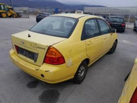 Suzuki Liana 1.3,1.6.-5бр., снимка 7